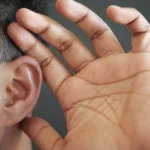 young-man-having-ear-pain-touching-his-painful-ear