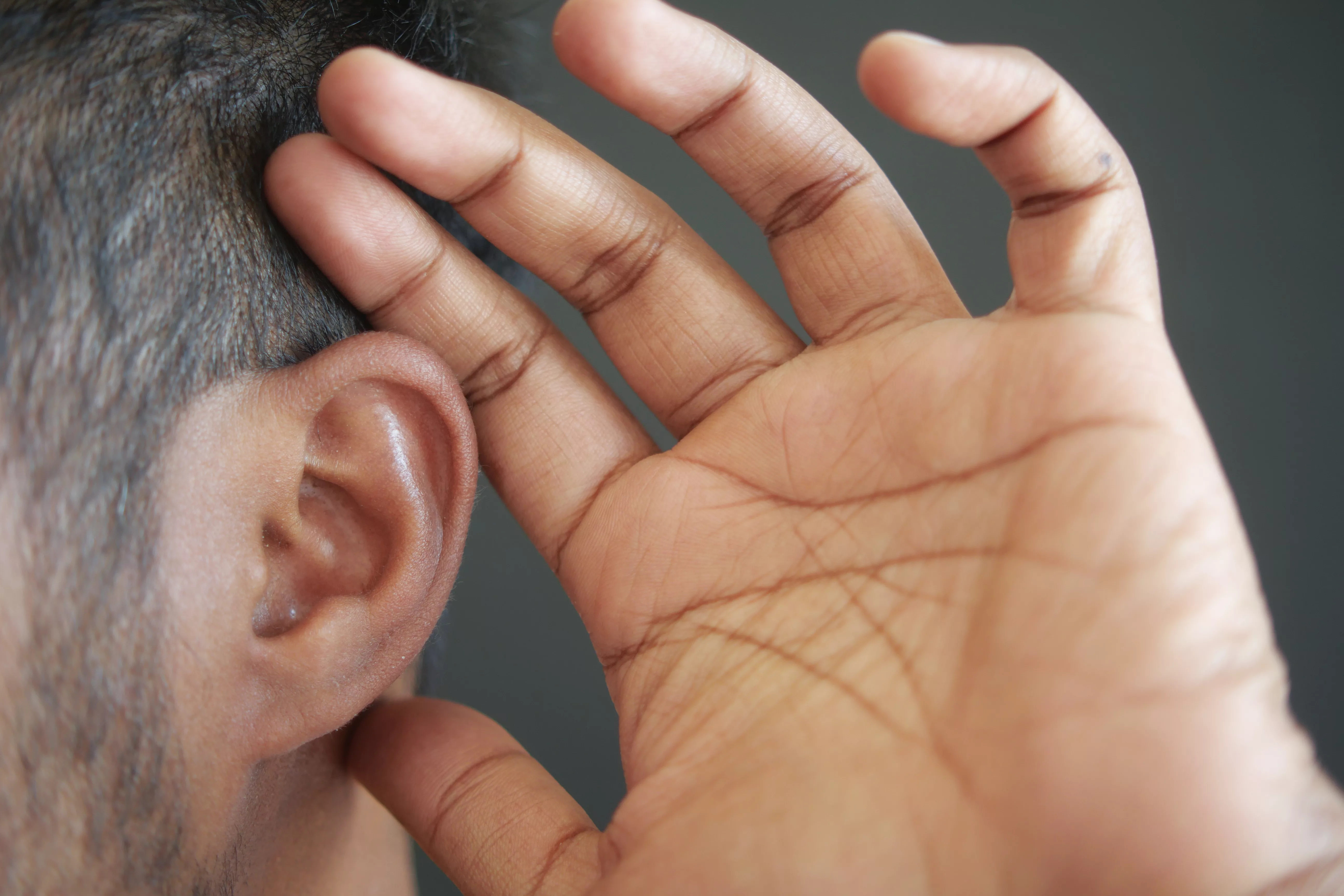 young-man-having-ear-pain-touching-his-painful-ear