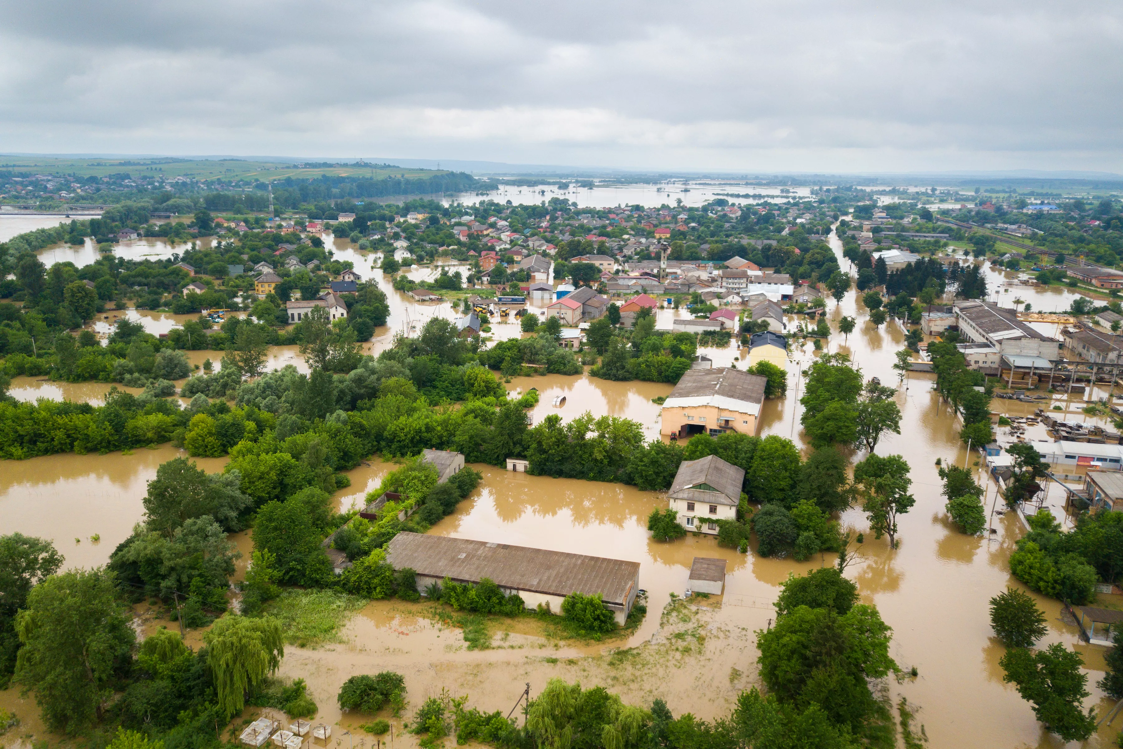 aerial-view-of-flooded-houses-with-dirty-water-of-dnister-river-in-halych-town-western-ukraine
