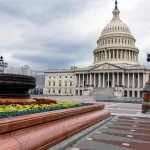 us-congress-dome-with-water-fountain-splashing-image