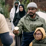 refugees-receiving-food-stocks