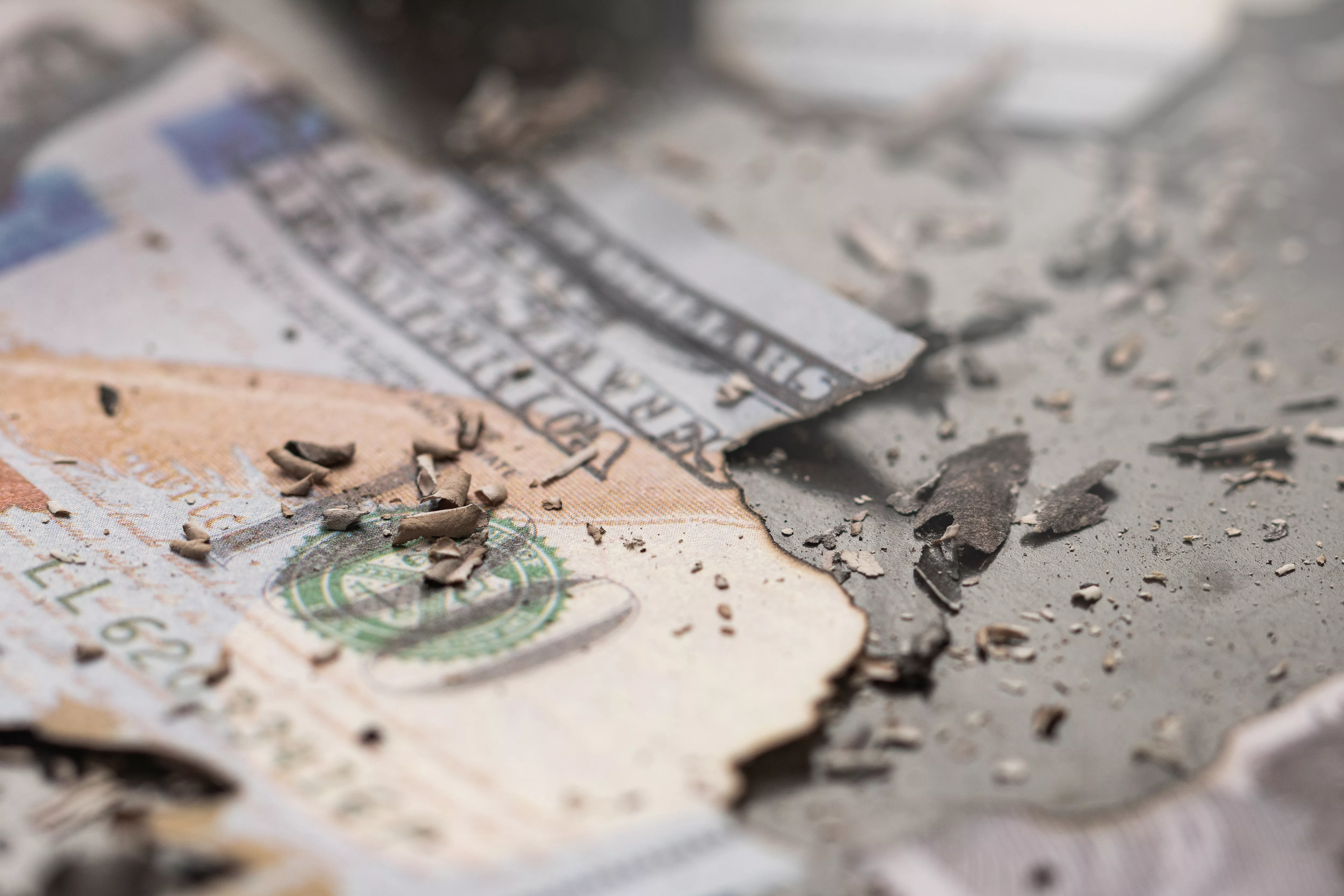 remains-of-burnt-one-hundred-dollar-bills-reduced-to-ashes-symbo