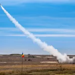 rocket-soaring-in-the-sky-with-a-billowing-cloud-of-smoke-trailing-behind-it