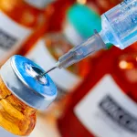 medical-vial-with-medication-and-syringe-close-up
