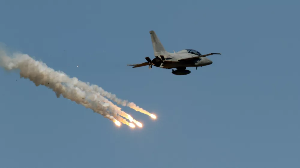 jet-aircraft-flying-in-the-sky-and-fireworks-smoking-below
