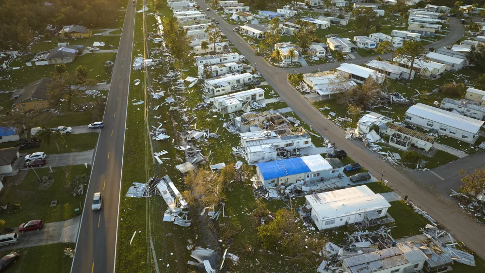 severely-damaged-houses-after-hurricane-ian-in-florida-mobile-home-residential-area-consequences-of-natural-disaster