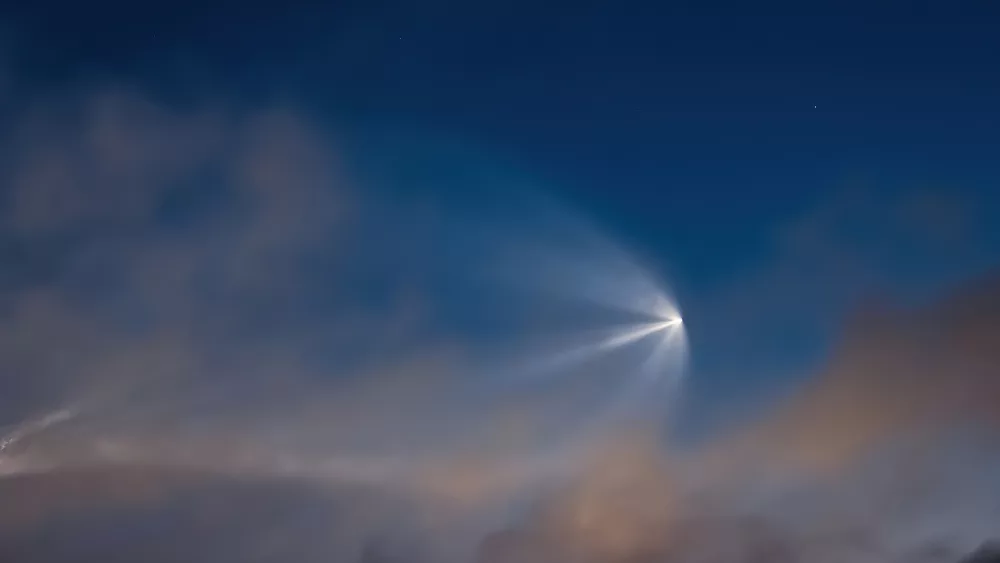 soyuz-space-rocket-launch-space-jellyfish-in-sky-plume-of-rocket-gases-in-sun-at-dawn