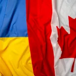 flags-of-ukraine-and-canada-folded-together