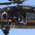 640px-cbp_rescues_illegal_immigrant_from_steep_cliff_air_and_marine_blackhawk_-_borstar_agents_integrate_efforts