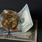 golden-coin-with-bitcoin-symbol-and-dollar-banknot-2023-11-27-05-26-08-utc