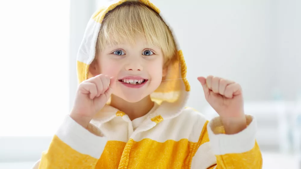 preschooler-boy-cleaned-teeth-with-dental-floss-an-2023-11-27-05-37-05-utc