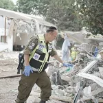 https://upload.wikimedia.org/wikipedia/commons/3/38/Disaster_Victim_Identification_after_2023_Hamas_attack_on_Israel_%28ZAKA193%29..JPG / Spokesperson unit of ZAKA