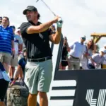 Brooks Koepka watches his shot during the LIV Golf Tournament held at the Trump National Golf Club in Bedminster^NJ. BEDMINSTER^NJ-AUGUST13^ 2023
