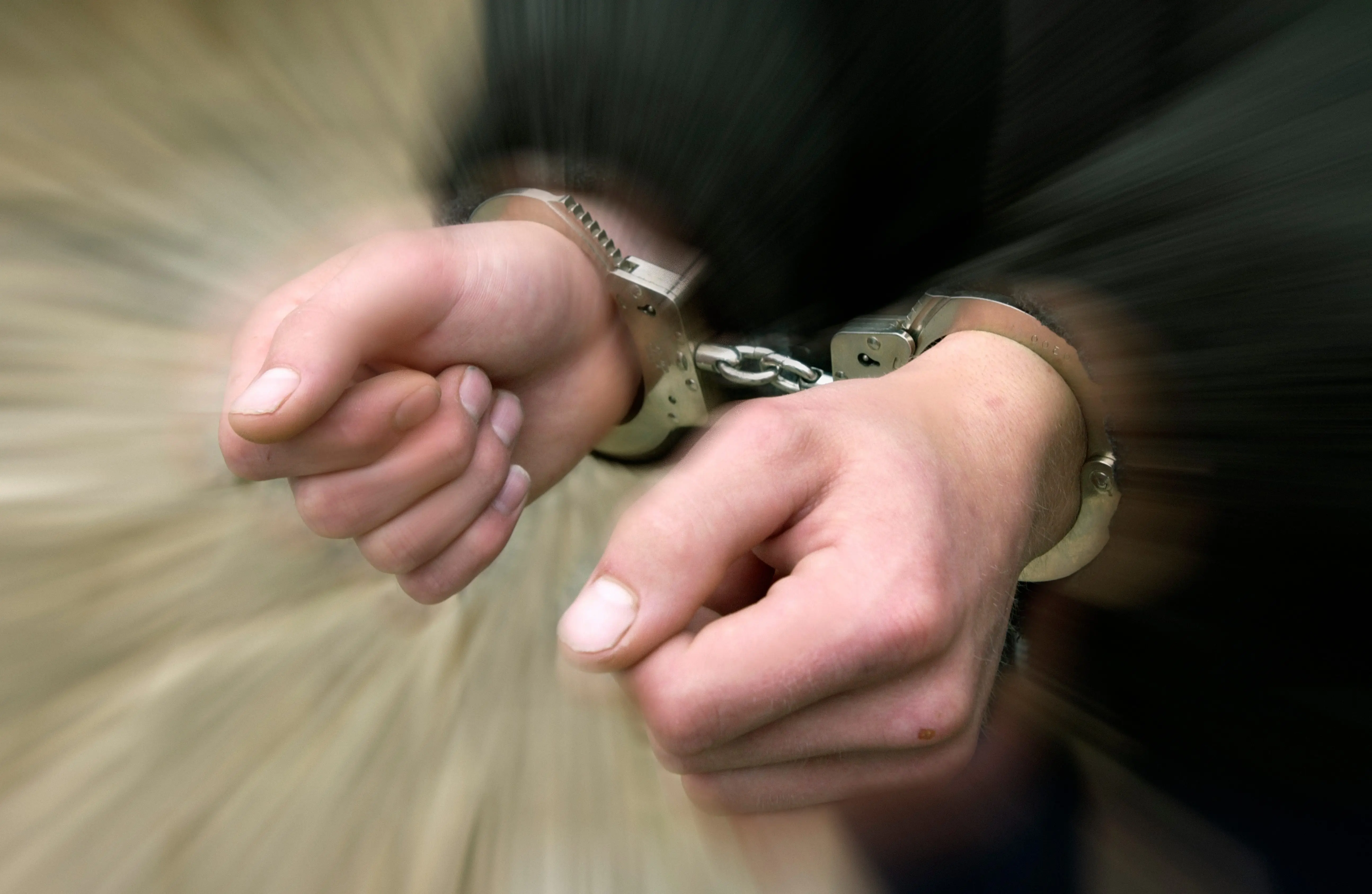 criminal-in-handcuffs