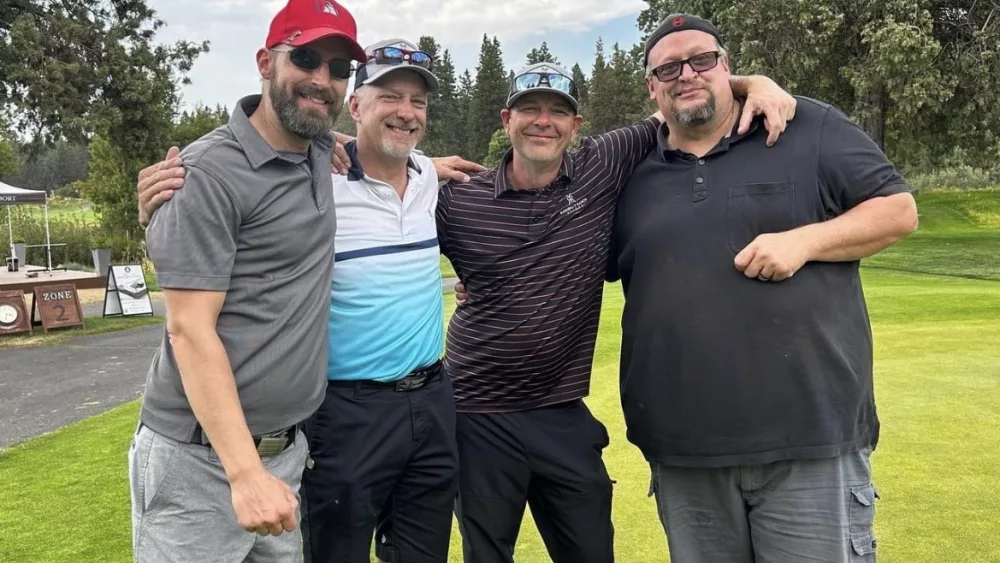 Brian Meier and teammates at the OIT Golf Challenge