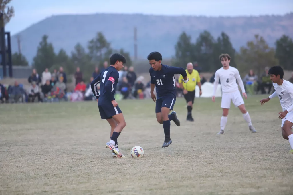 A photo from Henley boys soccer's playoff win over Gladstone