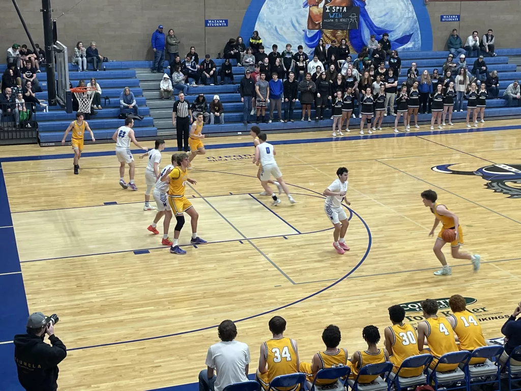 Henley boys basketball playing at Mazama