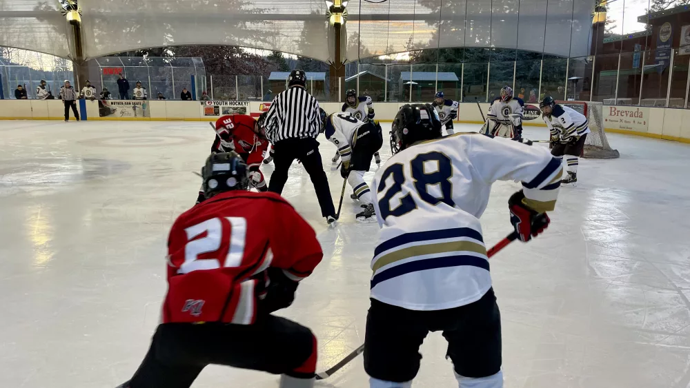 The Klamath Falls Ice Hawks line up for a faceoff against the Eugene Jr. Generals