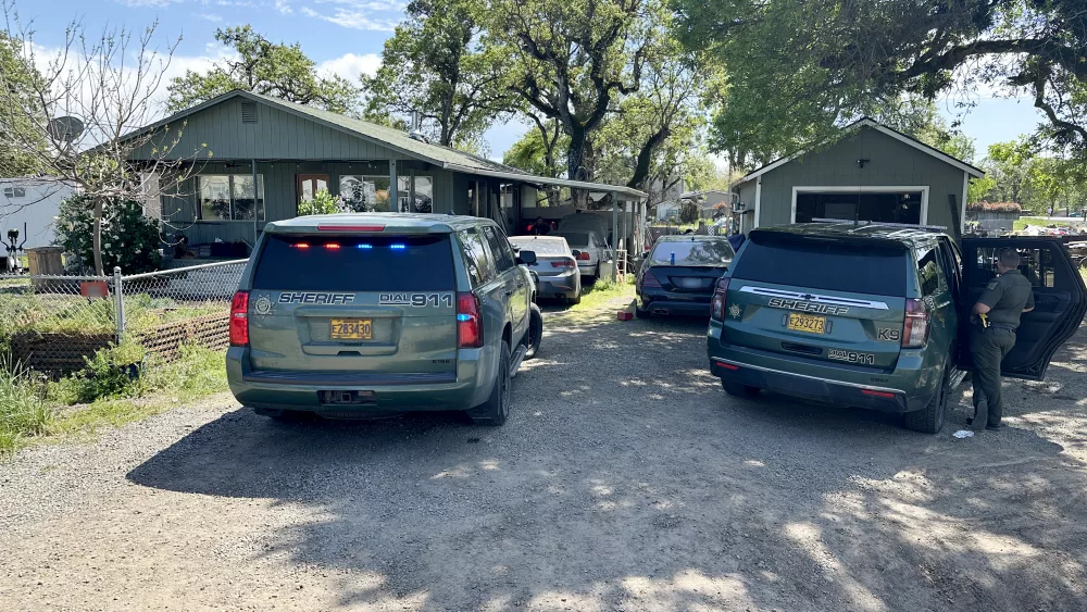 Jackson County Sheriff's cars outside a house