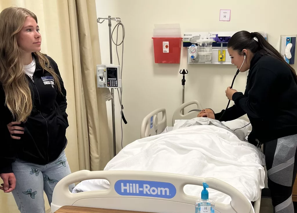 Mazama Health Occupations students Sandra Martin, left, and Leah Hernandez learn skills while shadowing health care professionals at Sky Lakes Medical Center