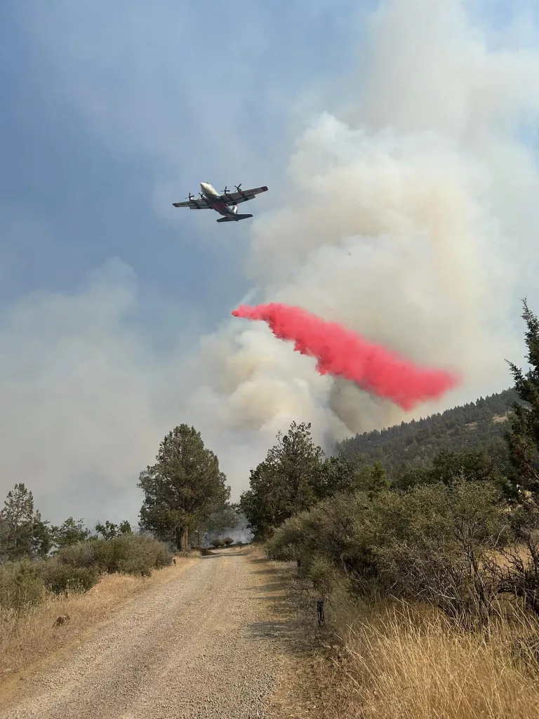 A plane dropping retardant near the Bogus Fire