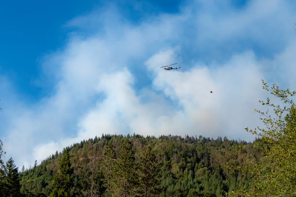 A water drop helicopter on the Dixon Fire