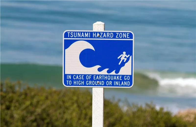 A tsunami hazard zone sign