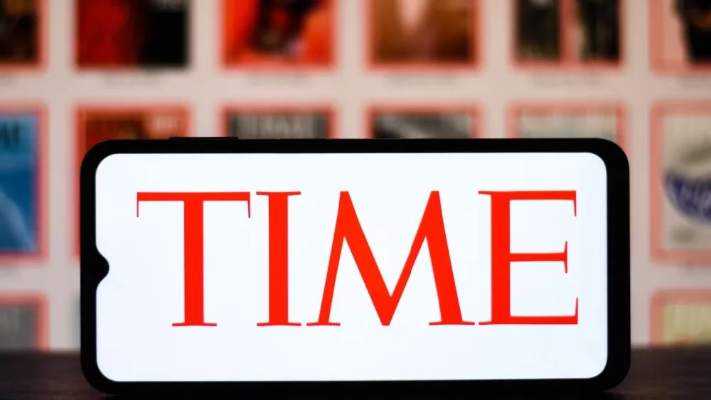 Time Magazine logo on a mobile screen stock image.