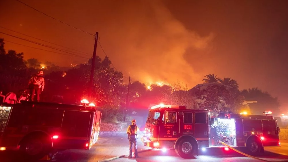 Firefighters battle the Eaton fire as its burns in Sierra Madre^ east side of Los Angeles^ California^ Wednesday^ Jan. 8^ 2025..