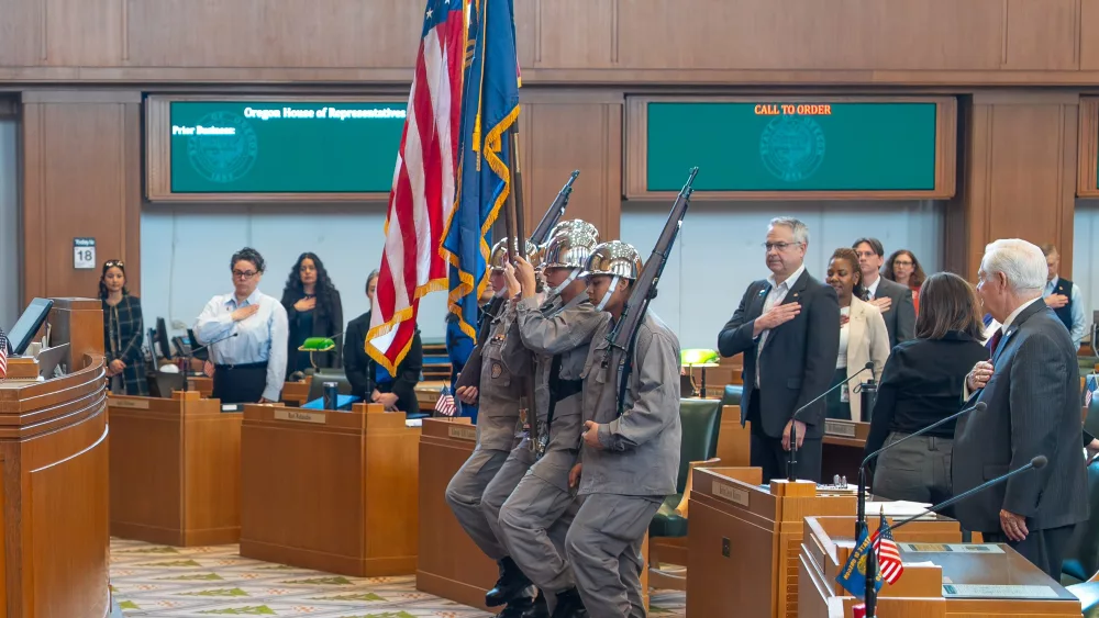 Cadets from the Oregon Youth ChalleNGe Program present the colors in the Oregon State House chamber at the State Capitol on Tuesday, March 18, 2025. The color guard ceremony opened the day's legislative session for state representatives. The program, administered by the Oregon National Guard, was recently recognized as the first in the nation to receive an "outstanding" rating under new federal evaluation criteria. (U.S. Army National Guard photo by Maj. W. Chris Clyne, Oregon National Guard Public Affairs)