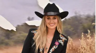 Lainey Wilson scores ninth No. 1 at country radio with “Somewhere Over Laredo”