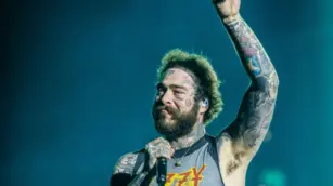 Post Malone delays stadium tour with Jelly Roll to finish upcoming new album
