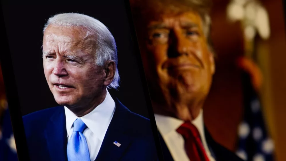 President Joe Biden in foreground^ President-elect Donald Trump is blurred in the background^ USA^ December 16^ 2024