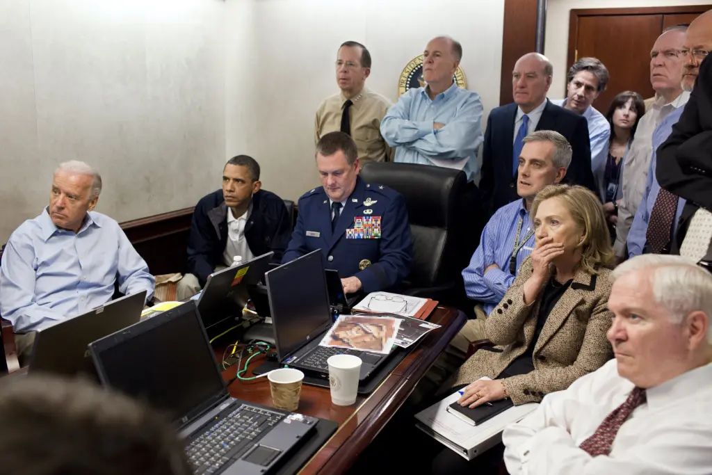Obama and members of the national security team receive an update on Operation Neptune's Spear in the White House Situation Room, May 1, 2011