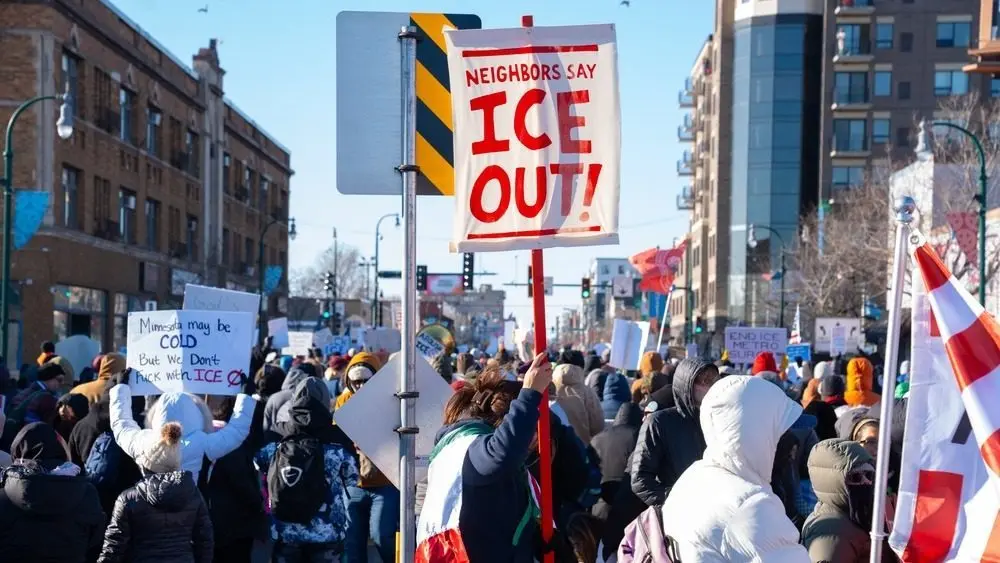 Minneapolis^ Minnesota^ USA 12.12.25 Hundreds of people gather to protest against ICE raids^ Trump and other political views during a cold day in Minnesota