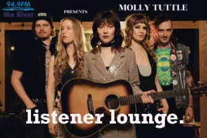 Molly tuttle Band photo with guitar