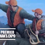 Nevada Premier Sportsmans expo slider, a man hunting with his 2 boys. Posing after a harvesting a buck.