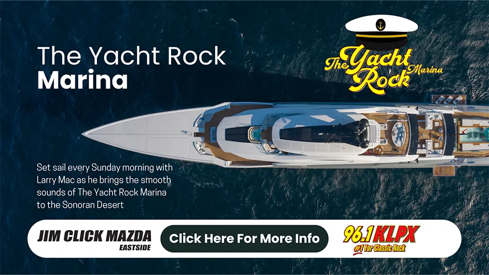 A top-down aerial view of a luxury yacht sailing on deep blue water with 'The Yacht Rock Marina' text and logo on the right. Promotional banner reads: 'Set sail every Sunday morning with Larry Mac as he brings the smooth sounds of The Yacht Rock Marina to the Sonoran Desert.' Sponsored by Jim Click Mazda Eastside and 96.1 KLPX, Tucson's #1 for Classic Rock, with a clickable button saying 'Click Here For More Info'.