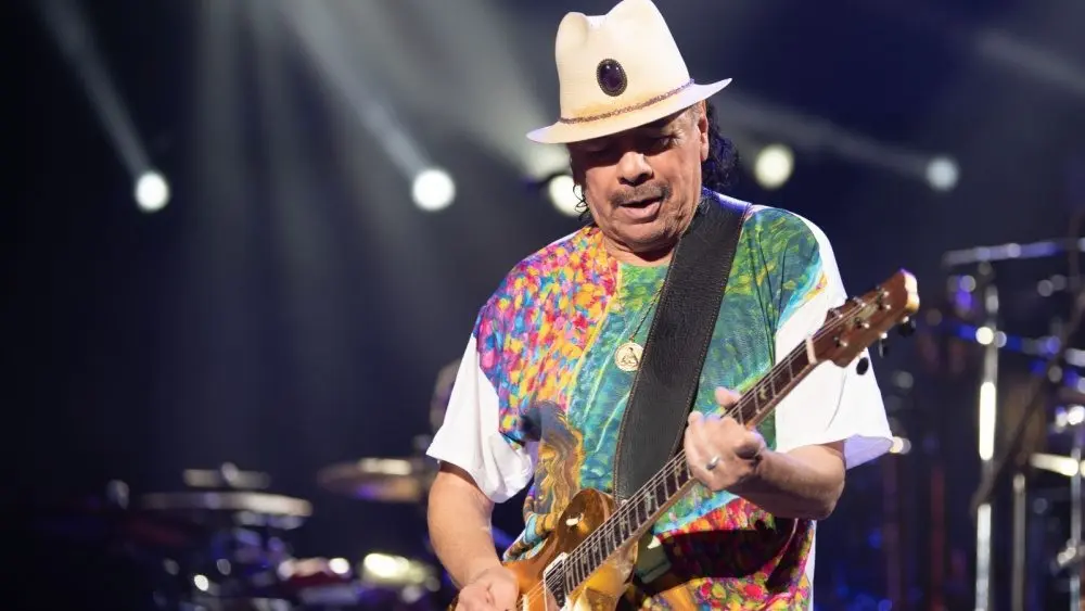 Carlos Santana performs on stage at the iThink Financial Amphitheatre. WEST PALM BEACH^ FLORIDA - AUGUST 22^ 2022