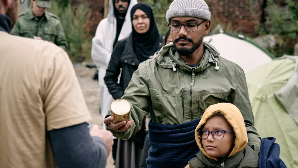 refugees-receiving-food-stocks