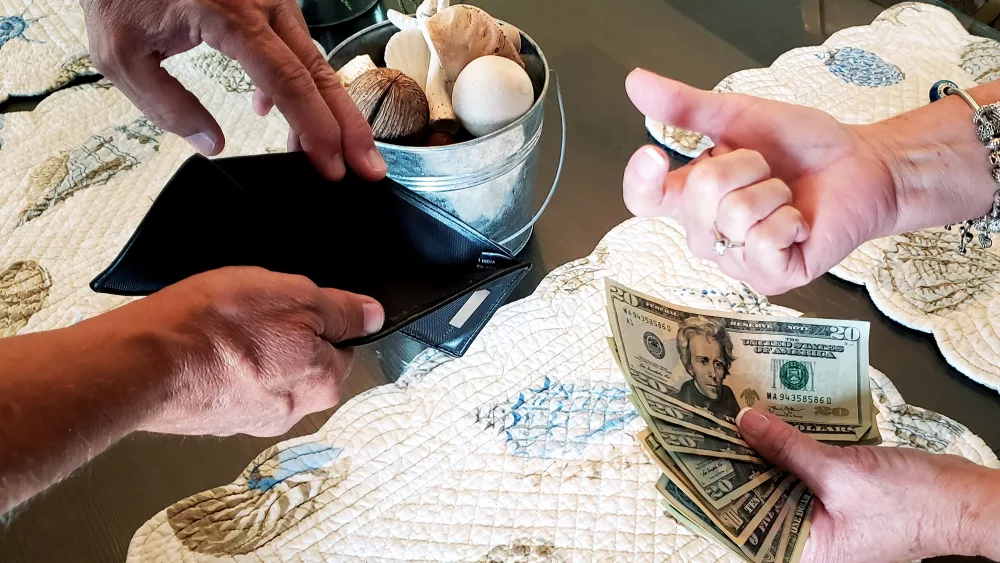 holiday-shopping-requires-money-and-as-wallets-are-2023-11-27-05-32-17-utc