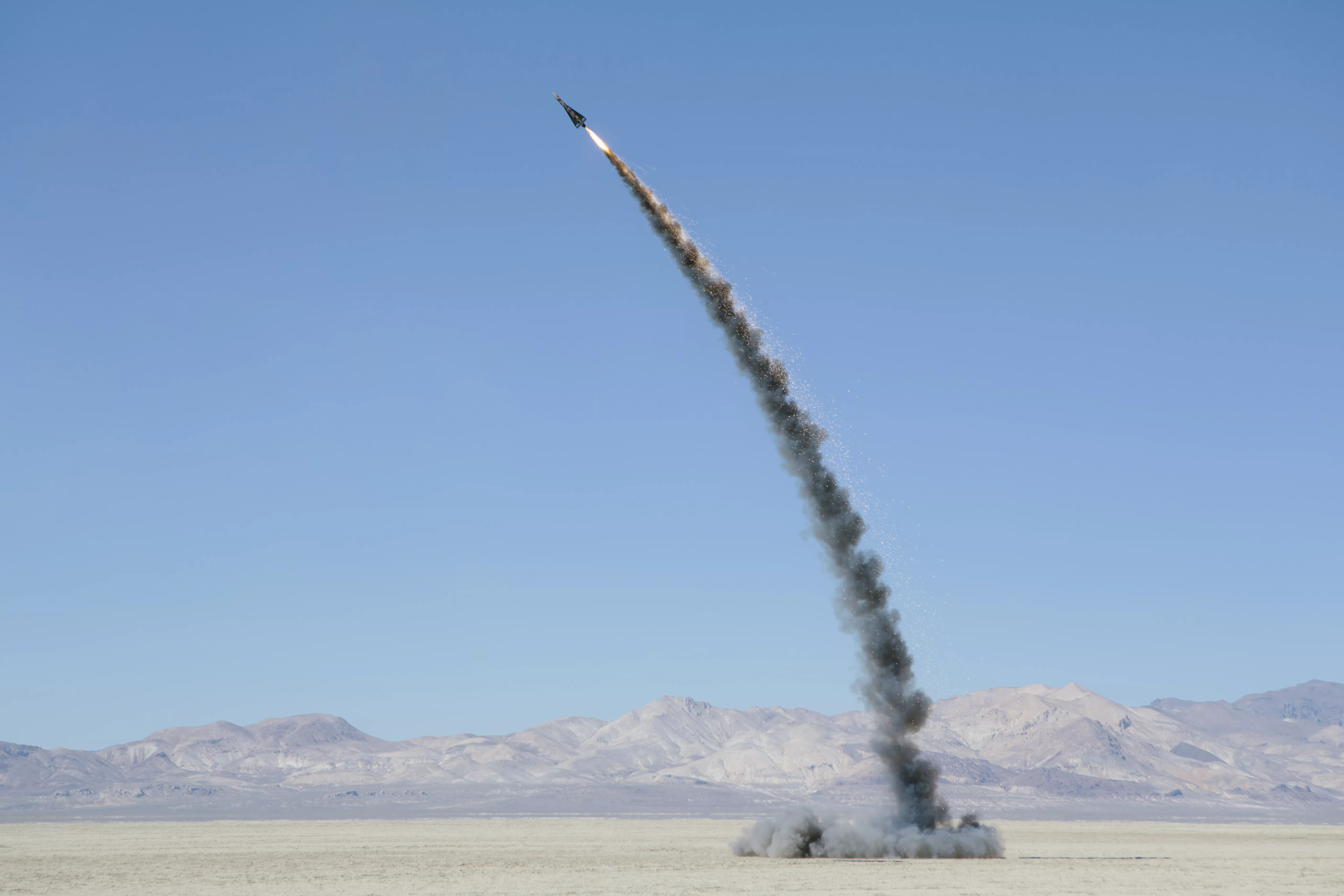 rocket-shooting-into-vast-desert-sky-black-rock-desert-nevadarocket-shooting-into-vast-desert-sky-black-rock-desert-nevadausa