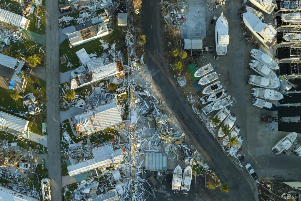 wind-damage-of-private-houses-after-hurricane-swept-through-florida-mobile-home-residential-area-consequences-of-natural-disaster