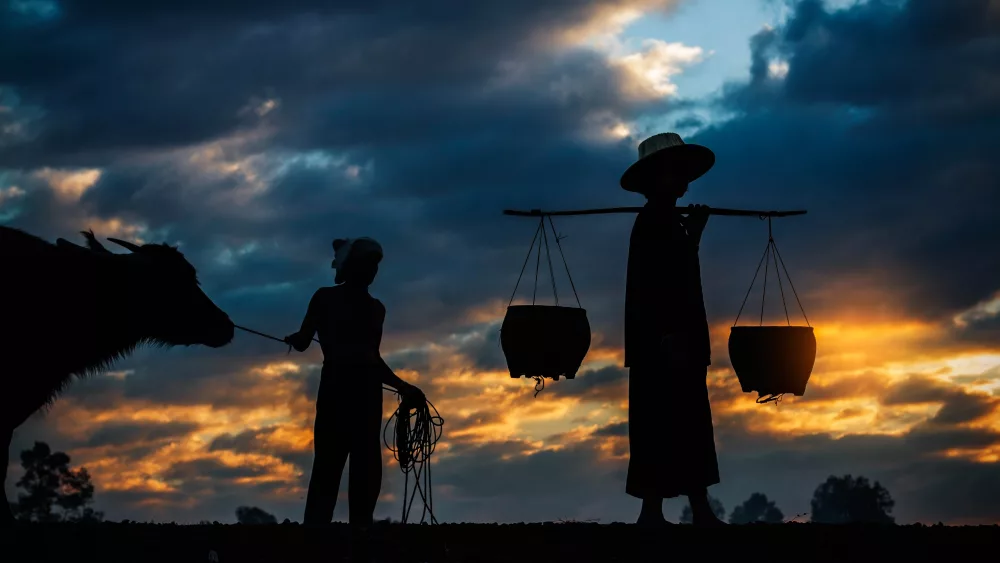 farmer-at-sunset