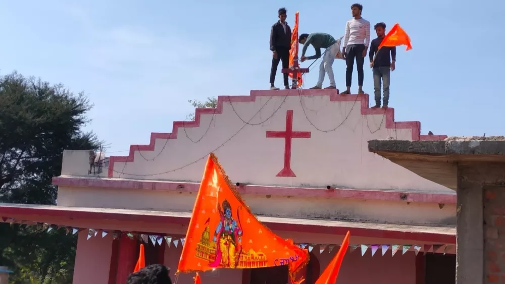 mob-attaches-flag-to-christian-church-in-india-jpg