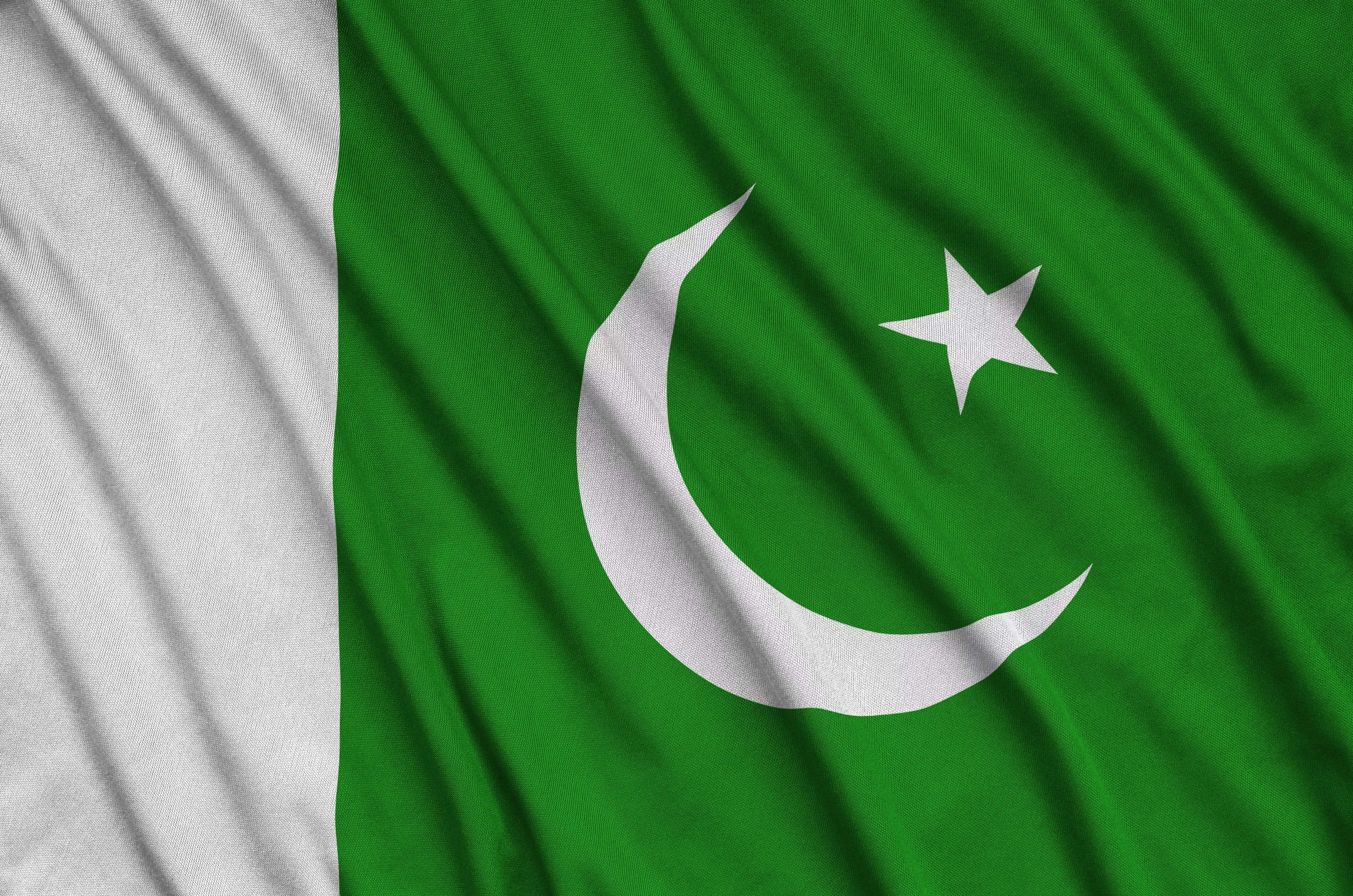 pakistan-flag-is-depicted-on-a-sports-cloth-fabric-with-many-folds-sport-team-banner