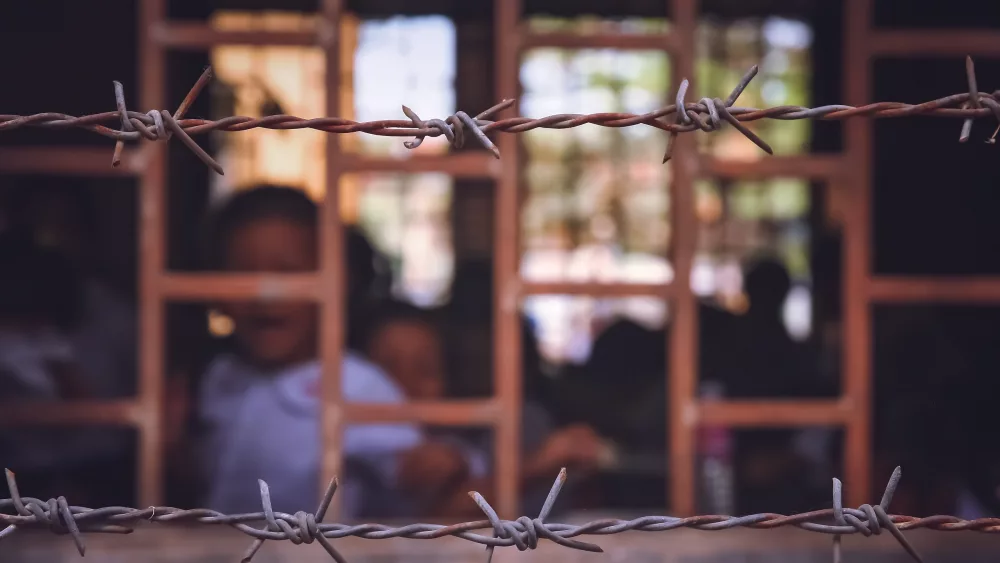 school-behind-barbed-wires