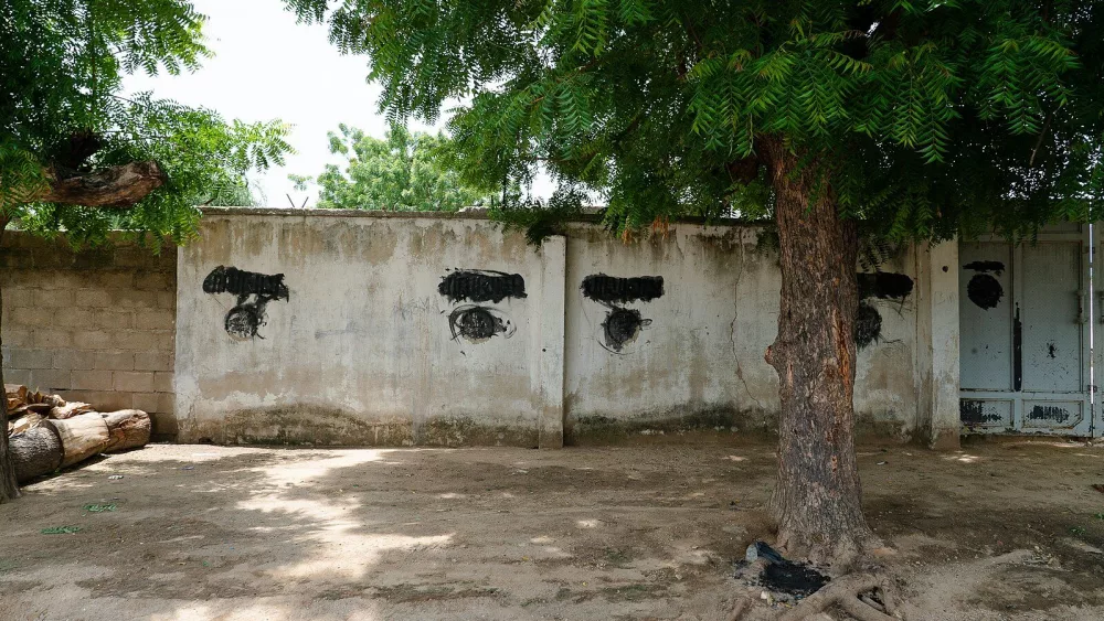 Boko Haram Insignias blacked out on Nigerian street / Ifeatu Nnaobi, CC BY-SA 4.0 , via Wikimedia Commons