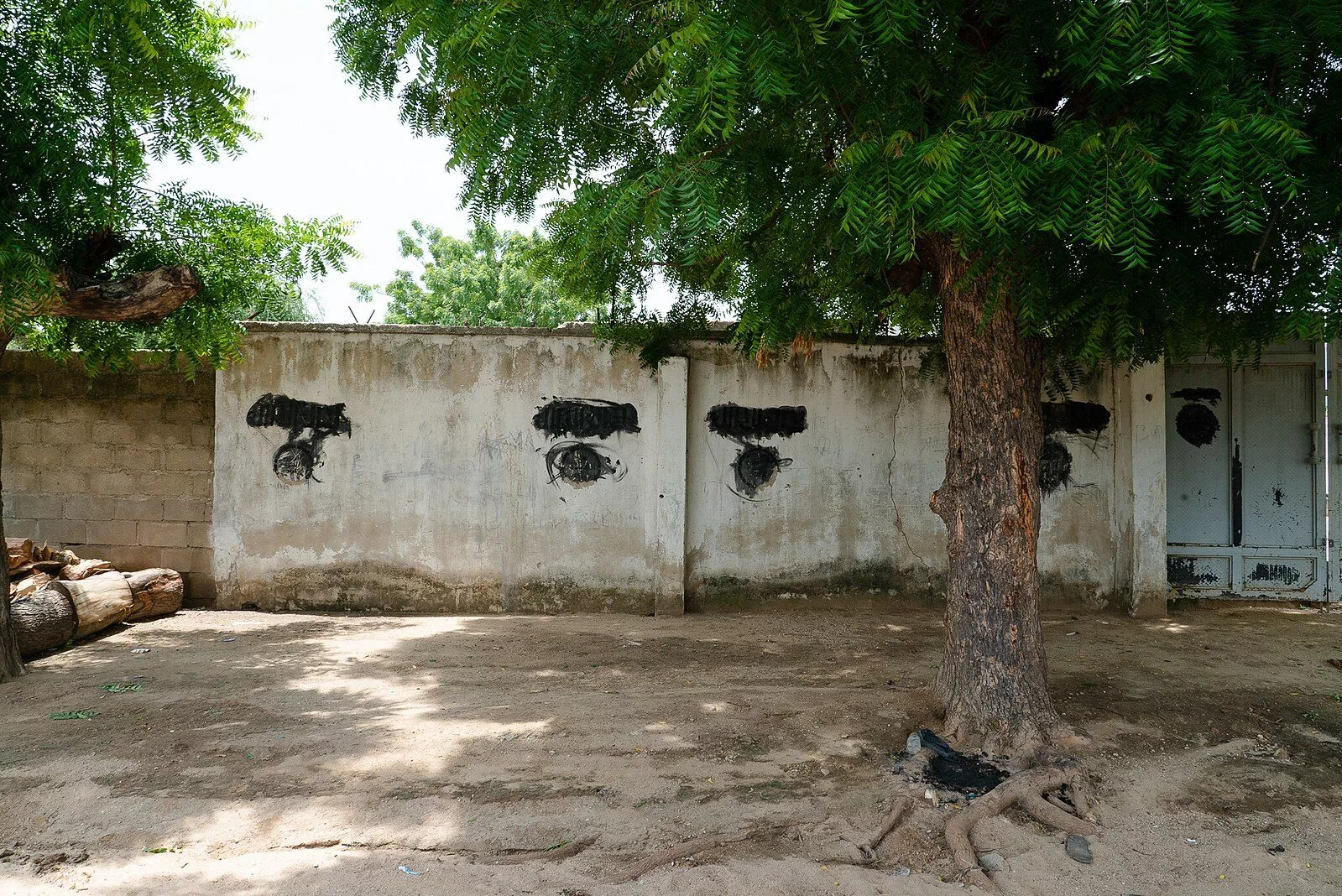 Boko Haram Insignias blacked out on Nigerian street / Ifeatu Nnaobi, CC BY-SA 4.0 , via Wikimedia Commons