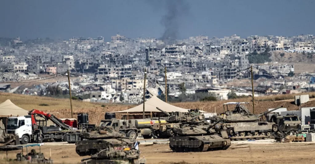 Israeli Airstrikes Kill 82 in Gaza as Aid Struggles to Get Through